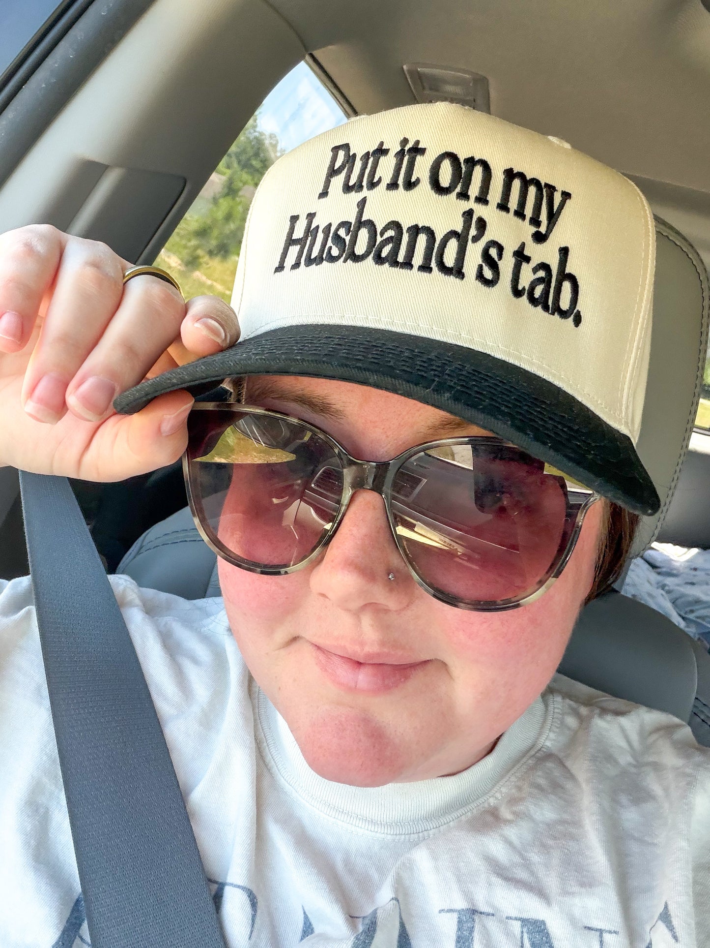 Put it on my husbands tab embroidered hat